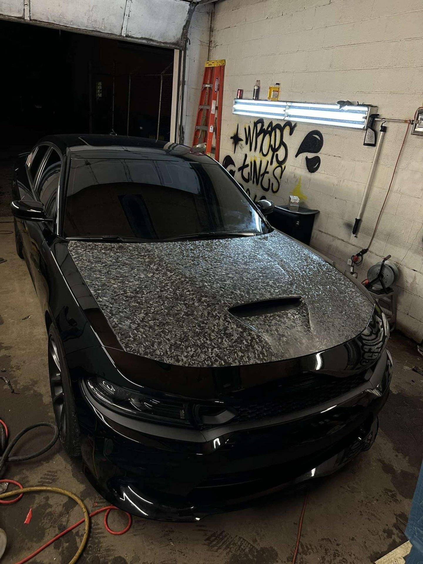 Forged carbon hood wrap.
