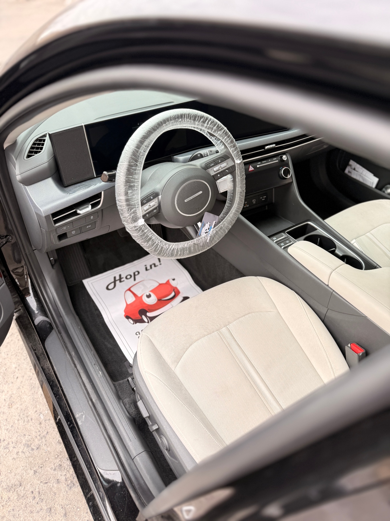 Hyundai light interior detail with seat & wheel protection