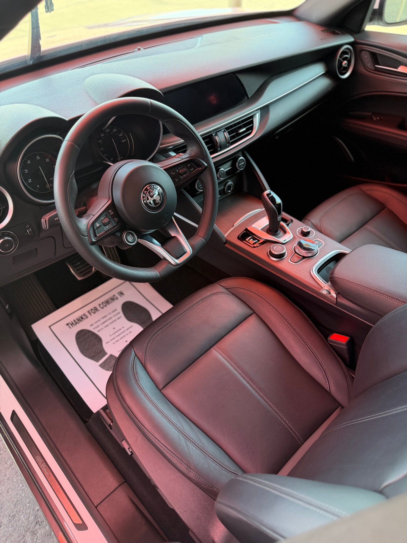Alfa Romeo Stelvio red leather interior detail
